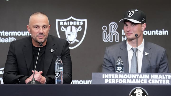 Apr 24, 2026; Henderson, NV, USA; Las Vegas Raiders quarterback Fernando Mendoza (right) and general manager John Spytek at introductory press conference at Intermountain Health Performance Center after being selected as the No. 1 pick in the 2026 NFL Draft. Mandatory Credit: Kirby Lee-Imagn Images