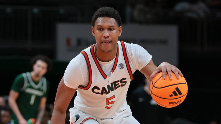Nov 3, 2025; Coral Gables, Florida, USA; Miami Hurricanes forward Malik Reneau (5) dribbles the basketball against the Jacksonville Dolphins during the second half at Watsco Center. Mandatory Credit: Sam Navarro-Imagn Images Nov 3, 2025; Coral Gables, Florida, USA; Miami Hurricanes forward Malik Reneau (5) dribbles the basketball against the Jacksonville Dolphins during the second half at Watsco Center. Mandatory Credit: Sam Navarro-Imagn Images