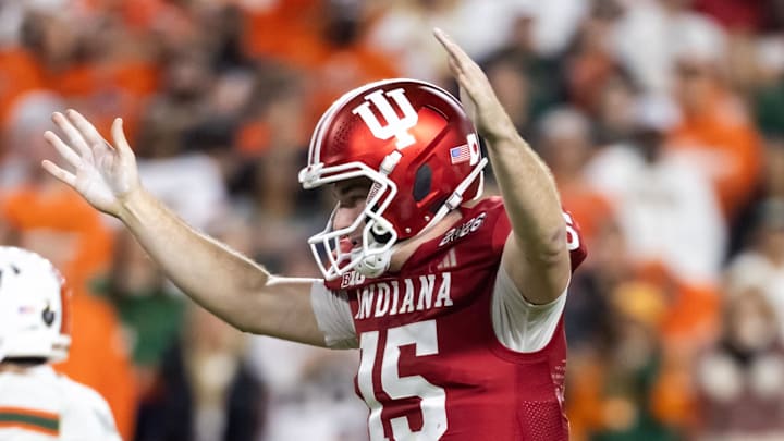 Jan 19, 2026; Miami Gardens, FL, USA; Indiana Hoosiers quarterback Fernando Mendoza (15) celebrates a touchdown against the Miami Hurricanes in the College Football Playoff National Championship game at Hard Rock Stadium. Mandatory Credit: Mark J. Rebilas-Imagn Images Jan 19, 2026; Miami Gardens, FL, USA; Indiana Hoosiers quarterback Fernando Mendoza (15) celebrates a touchdown against the Miami Hurricanes in the College Football Playoff National Championship game at Hard Rock Stadium. Mandatory Credit: Mark J. Rebilas-Imagn Images