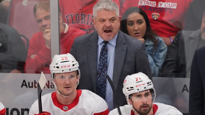 Jan 16, 2025; Sunrise, Florida, USA; Detroit Red Wings head coach Todd McLellan reacts from the bench against the Florida Panthers during the second period at Amerant Bank Arena. Mandatory Credit: Sam Navarro-Imagn Images