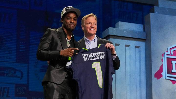 Apr 27, 2023; Kansas City, MO, USA;  Illinois cornerback Devon Witherspoon with NFL commissioner Roger Goodell after being selected by the Seattle Seahawks fifth overall in the first round of the 2023 NFL Draft at Union Station. Mandatory Credit: Kirby Lee-Imagn Images
