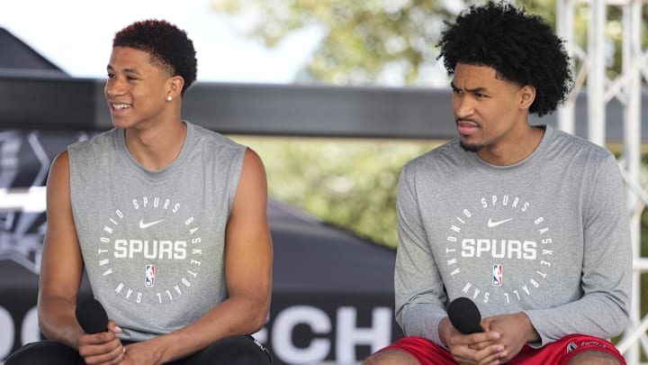 Jun 28, 2025; San Antonio, TX, USA; San Antonio first round draft picks Carter Bryant (left) and Dylan Harper answer questions during the Spurs Family Cookout at Victory Capital Performance Center. Mandatory Credit: Scott Wachter-Imagn Images Jun 28, 2025; San Antonio, TX, USA; San Antonio first round draft picks Carter Bryant (left) and Dylan Harper answer questions during the Spurs Family Cookout at Victory Capital Performance Center. Mandatory Credit: Scott Wachter-Imagn Images