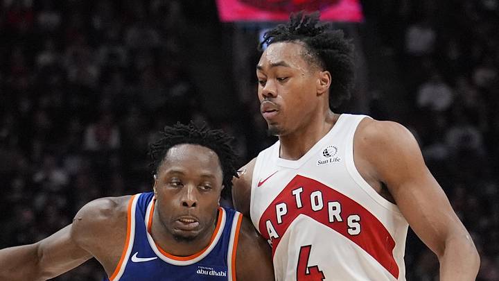 New York Knicks forward OG Anunoby drives to the net against Toronto Raptors guard Scottie Barnes.