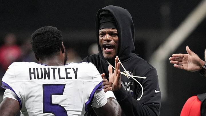 Baltimore Ravens quarterback Tyler Huntley celebrates with Lamar Jackson Baltimore Ravens quarterback Tyler Huntley celebrates with Lamar Jackson