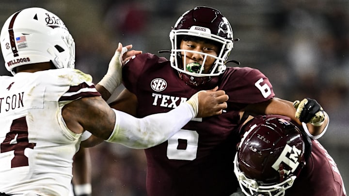Texas A&M Aggies tight end Jaden Platt (6) and Mississippi State Bulldogs linebacker Nathaniel Watson (14) in action during the second half at Kyle Field.
