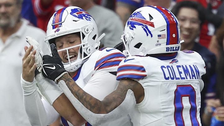 Oct 6, 2024; Houston, Texas, USA; Buffalo Bills quarterback Josh Allen (17) celebrates with wide receiver Keon Coleman (0) after a touchdown during the third quarter against the Houston Texans at NRG Stadium. Mandatory Credit: Troy Taormina-Imagn Images Oct 6, 2024; Houston, Texas, USA; Buffalo Bills quarterback Josh Allen (17) celebrates with wide receiver Keon Coleman (0) after a touchdown during the third quarter against the Houston Texans at NRG Stadium. Mandatory Credit: Troy Taormina-Imagn Images
