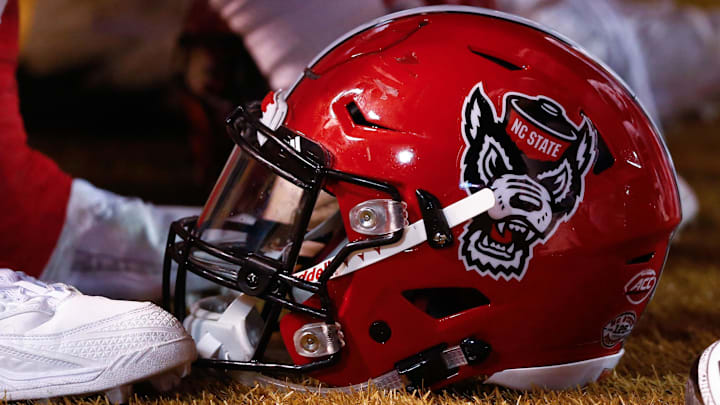 Nov 18, 2017; Winston-Salem, NC, USA; A North Carolina State Wolfpack helmet lays on the sidelines during the game against the Wake Forest Demon Deacons at BB&T Field. Mandatory Credit: Jeremy Brevard-Imagn Images