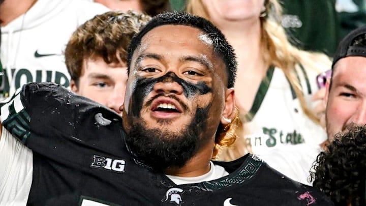 Michigan State's Ben Roberts celebrates with fans after defeating Boston College on Saturday, Sept. 6, 2025, at Spartan Stadium in East Lansing.