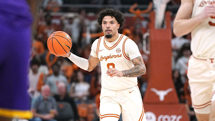 Texas Longhorns guard Jordan Pope sets the play against the LSU Tigers.