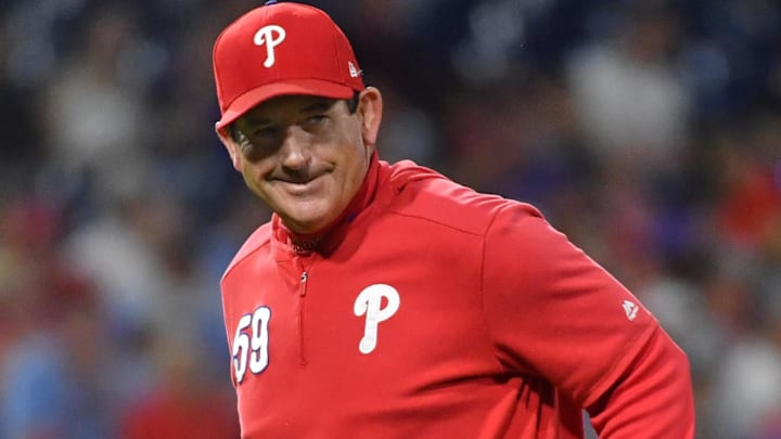 Philadelphia Phillies manager Rob Thomson (59) walks back to the dugout after making a pitching change against the New York Mets at Citizens Bank Park.