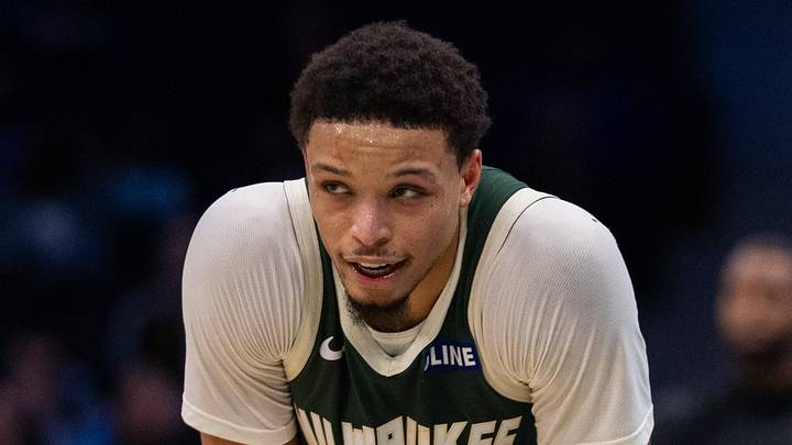 Milwaukee Bucks guard Ryan Rollins (13) talks with head coach Taylor Jenkins during the third quarter at Spectrum Center on October 11, 2026.
