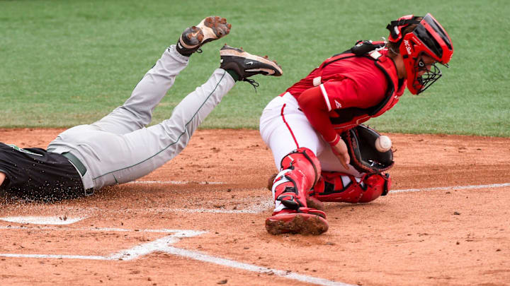 Stetson Hatters' Foster Apple (8) slides safely into home as
NC State Wolfpack's Alex Sosa (13) catches the late throw during the NCAA Baseball Regional Tournament at Plainsman Park in Auburn, Ala., on Friday May 30, 2025. Stetson Hatters' Foster Apple (8) slides safely into home as
NC State Wolfpack's Alex Sosa (13) catches the late throw during the NCAA Baseball Regional Tournament at Plainsman Park in Auburn, Ala., on Friday May 30, 2025.