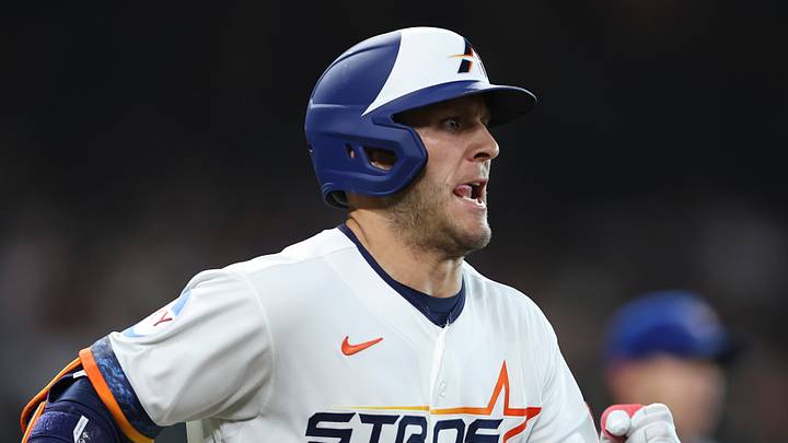 Houston Astros center fielder Daulton Varsho (18) runs to first base on an infield single during the first inning against the Toronto Blue Jays at Daikin Park. Mandatory Credit: Troy Taormina-Imagn Images