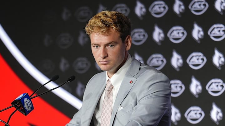 Jul 23, 2025; Charlotte, NC, USA; Louisville quarterback Miller Moss answers questions from the media during ACC Media days at Hilton Charlotte Uptown. Mandatory Credit: Jim Dedmon-Imagn Images