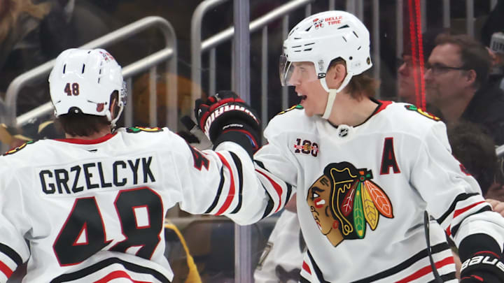 Jan 29, 2026; Pittsburgh, Pennsylvania, USA;  Chicago Blackhawks defenseman Matt Grzelcyk (48) congratulates defenseman Connor Murphy (right) on his goal against the Pittsburgh Penguins during the first period at PPG Paints Arena. Mandatory Credit: Charles LeClaire-Imagn Images