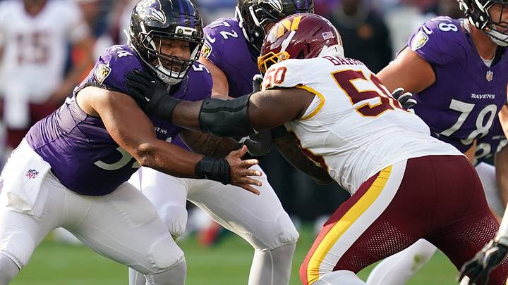 Aug 28, 2026; Baltimore, Maryland, USA; Baltimore Ravens center Jovaughn Gwyn (54) blocks Washington Commanders tackle Ricky Barber (50) during the first quarter at M&T Bank Stadium. Mandatory Credit: Mitch Stringer-Imagn Images Aug 28, 2026; Baltimore, Maryland, USA; Baltimore Ravens center Jovaughn Gwyn (54) blocks Washington Commanders tackle Ricky Barber (50) during the first quarter at M&T Bank Stadium. Mandatory Credit: Mitch Stringer-Imagn Images