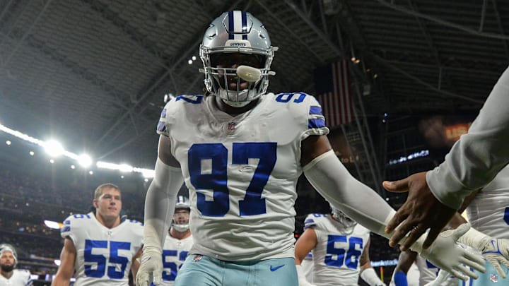 Oct 31, 2021; Minneapolis, Minnesota, USA; Dallas Cowboys defensive tackle Osa Odighizuwa (97) and outside linebacker Leighton Vander Esch (55) and teammates head for the locker room before the game against the Minnesota Vikings at U.S. Bank Stadium. Mandatory Credit: Jeffrey Becker-Imagn Images