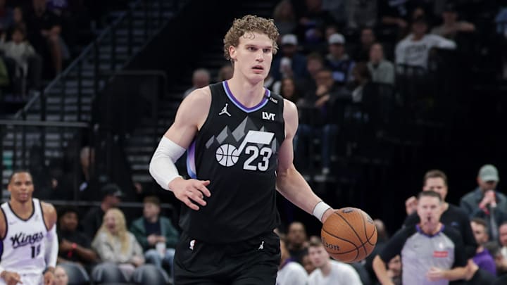 Nov 28, 2025; Salt Lake City, Utah, USA; Utah Jazz forward Lauri Markkanen (23) brings the ball up the court against the Sacramento Kings during the second half at Delta Center. Mandatory Credit: Chris Nicoll-Imagn Images