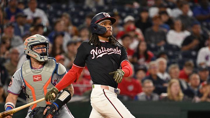 Sep 25, 2026; Washington, District of Columbia, USA;  Washington Nationals shortstop CJ Abrams (5) watches the ball after hitting the ball into play against the New York Mets during the first inning at Nationals Park.  Mandatory Credit: Rafael Suanes-Imagn Images