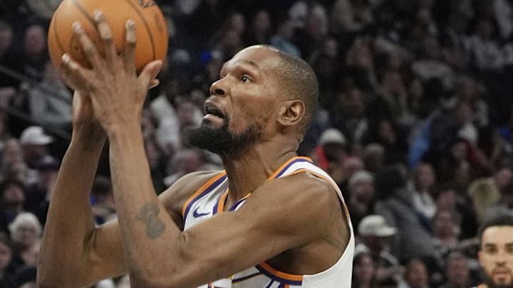Mar 28, 2025; Minneapolis, Minnesota, USA; Phoenix Suns forward Kevin Durant (35) shoots against the Minnesota Timberwolves in the third quarter at Target Center. Mandatory Credit: Bruce Kluckhohn-Imagn Images
