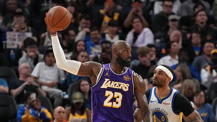 Apr 9, 2026; San Francisco, California, USA; Los Angeles Lakers forward LeBron James (23) holds onto the ball next to Golden State Warriors guard Gary Payton II (0) in the third quarter at the Chase Center. Mandatory Credit: Cary Edmondson-Imagn Images Apr 9, 2026; San Francisco, California, USA; Los Angeles Lakers forward LeBron James (23) holds onto the ball next to Golden State Warriors guard Gary Payton II (0) in the third quarter at the Chase Center. Mandatory Credit: Cary Edmondson-Imagn Images