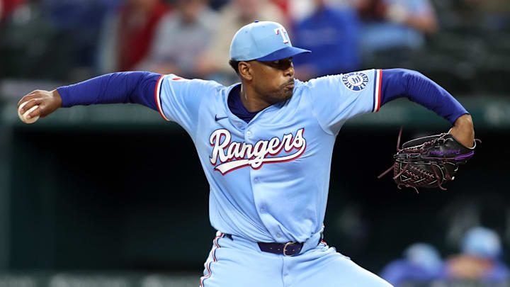Apr 6, 2025; Arlington, Texas, USA; Texas Rangers pitcher Kumar Rocker (80) throws a pitch during the first inning against the Tampa Bay Rays at Globe Life Field. 