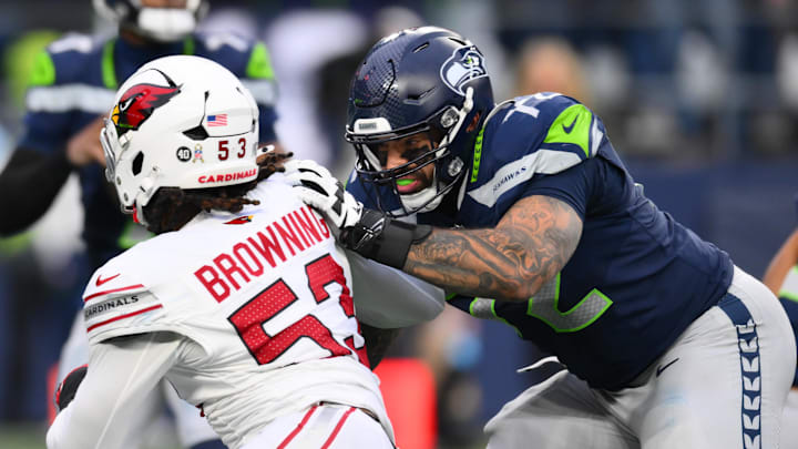 Nov 24, 2024; Seattle, Washington, USA; Seattle Seahawks offensive tackle Abraham Lucas (72) blocks Arizona Cardinals linebacker Baron Browning (53) during the second half at Lumen Field.