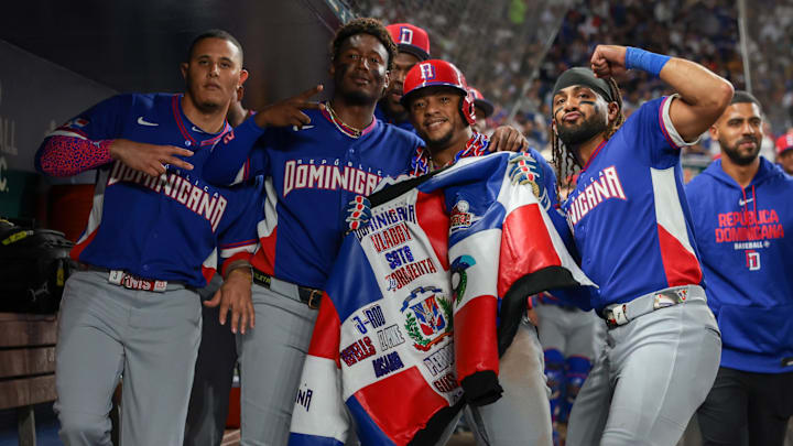 Mar 11, 2026; Miami, FL, United States; Dominican Republic second baseman Ketel Marte (4) celebrates with third baseman Manny MacHado (3), shortstop Geraldo Perdomo (2), and right fielder Fernando Tatis Jr. (23) after hitting a home run against Venezuela during the third inning at loanDepot Park. Mandatory Credit: Sam Navarro-Imagn Images
