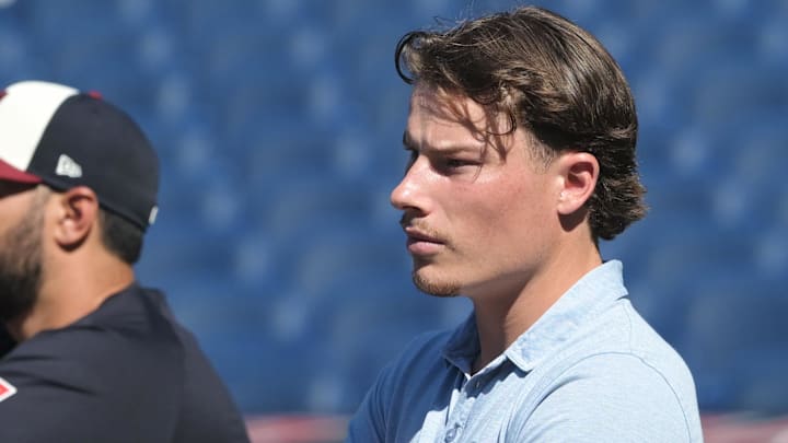 Jul 19, 2024; Cleveland, Ohio, USA; Cleveland Guardians number one draft pick Travis Bazzana watches batting practice before the game between the Cleveland Guardians and the San Diego Padres at Progressive Field. Mandatory Credit: Ken Blaze-Imagn Images Jul 19, 2024; Cleveland, Ohio, USA; Cleveland Guardians number one draft pick Travis Bazzana watches batting practice before the game between the Cleveland Guardians and the San Diego Padres at Progressive Field. Mandatory Credit: Ken Blaze-Imagn Images