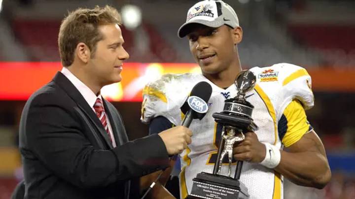 Former WVU QB Pat White holding the Fiesta Bowl trophy. Former WVU QB Pat White holding the Fiesta Bowl trophy.