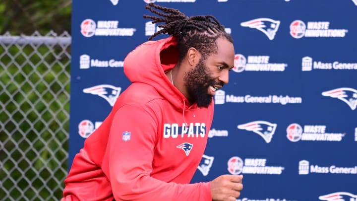 New England Patriots linebacker Matthew Judon (9) runs onto the practice field at minicamp 