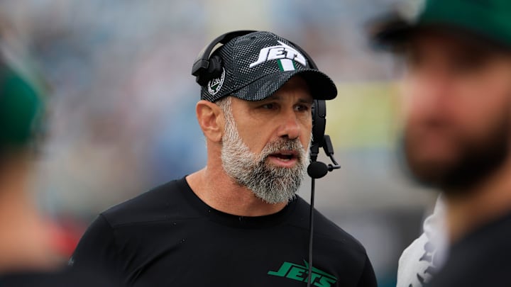 Former New York Jets interim coach Jeff Ulbrich stands on the sidelines.