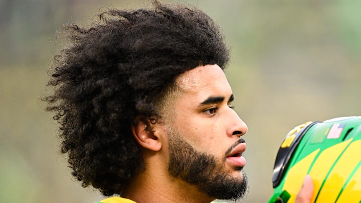 Dec 20, 2025; Eugene, OR, USA; Oregon Ducks quarterback Dante Moore (5) looks on before the game against the James Madison Dukes at Autzen Stadium. 