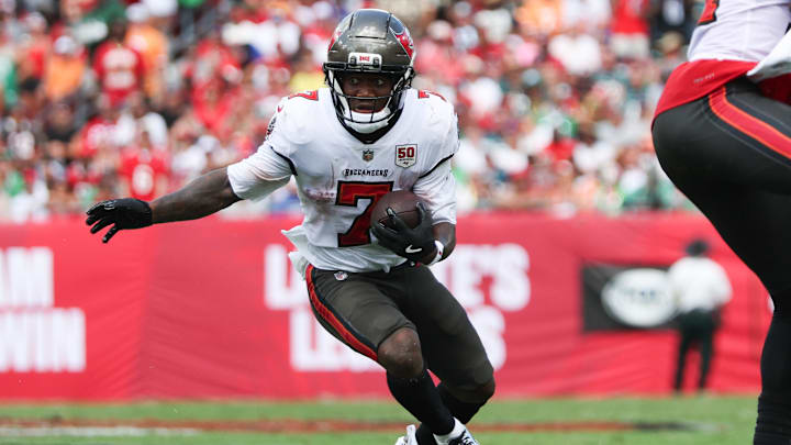 Sep 28, 2025; Tampa, Florida, USA; Tampa Bay Buccaneers running back Bucky Irving (7) runs the ball during the first quarter against the Philadelphia Eagles  at Raymond James Stadium. Mandatory Credit: Nathan Ray Seebeck-Imagn Images