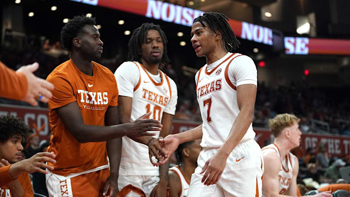 Texas Longhorns guard Simeon Wilcher (7) returns to the bench during the second half against the Le Moyne Dolphins at Moody Center. Texas Longhorns guard Simeon Wilcher (7) returns to the bench during the second half against the Le Moyne Dolphins at Moody Center.