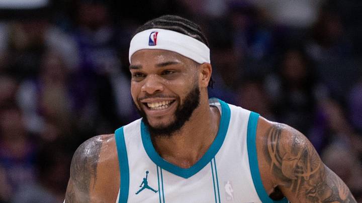 Feb 24, 2025; Sacramento, California, USA; Charlotte Hornets forward Miles Bridges (0) reacts after scoring against the Sacramento Kings during the second quarter at Golden 1 Center. Mandatory Credit: Ed Szczepanski-Imagn Images