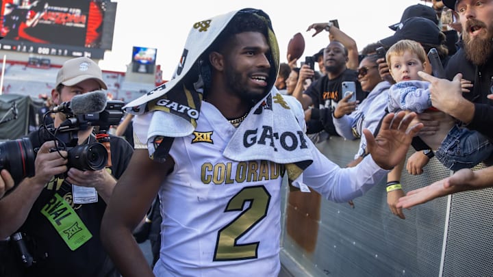 Oct 19, 2024; Tucson, Arizona, USA; Colorado Buffalos quarterback Shedeur Sanders (2) greets fans after defeating the Arizona Wildcats at Arizona Stadium. Mandatory Credit: Mark J. Rebilas-Imagn Images