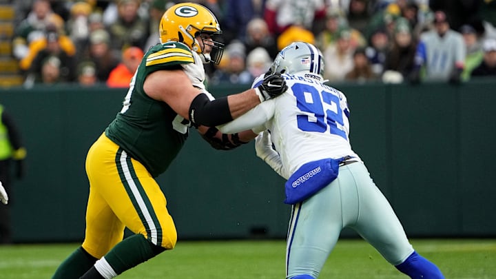 Nov 13, 2022; Green Bay, Wis, USA; Green Bay Packers offensive tackle David Bakhtiari (69) blocks Dallas Cowboys defensive end Dorance Armstrong (92) during the first quarter at Lambeau Field. The Packers defeated the Cowboys 31-28 in overtime. Mandatory Credit: Mark Hoffman/Milwaukee Journal Sentinal/USA Today Sports