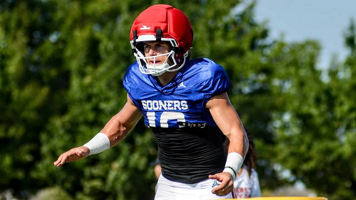 Oklahoma quarterback John Mateer prepares to take a snap in practice. Oklahoma quarterback John Mateer prepares to take a snap in practice.