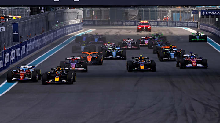 May 4, 2024; Miami Gardens, Florida, USA; Red Bull Racing driver Max Verstappen (1) leads the start of the F1 Sprint Race at Miami International Autodrome. Mandatory Credit: Peter Casey-Imagn Images