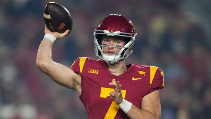 USC quarterback Miller Moss throws a pass during a game.