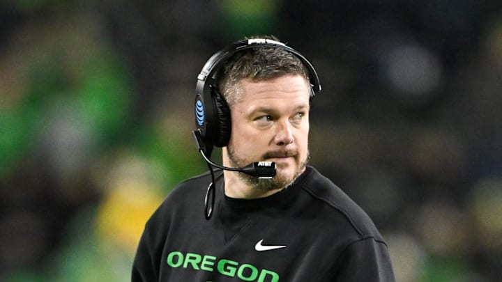 Dec 20, 2025; Eugene, OR, USA;  Oregon Ducks head coach Dan Lanning looks on during the fourth quarter against the James Madison Dukes at Autzen Stadium. Mandatory Credit: Craig Strobeck-Imagn Images