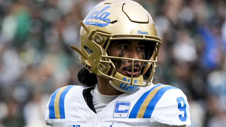 Oct 11, 2025; East Lansing, Michigan, USA; UCLA Bruins quarterback Nico Iamaleava (9) looks for an open receiver in the second quarter at Spartan Stadium. Mandatory Credit: Brendan Mullin-Imagn Images