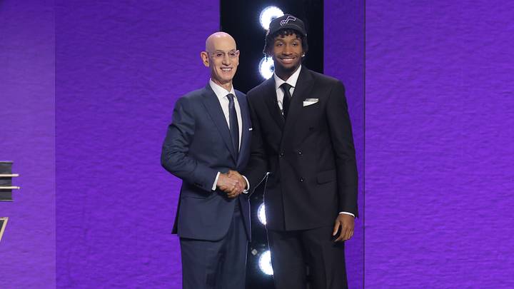 Jun 23, 2026; New York, NY, USA; NBA commissioner Adam Silver greets the second pick in the 2026 NBA draft, Kansas guard Darryn Peterson after he was selected by the Utah Jazz at Barclays Center. Mandatory Credit: Brad Penner-Imagn Images
