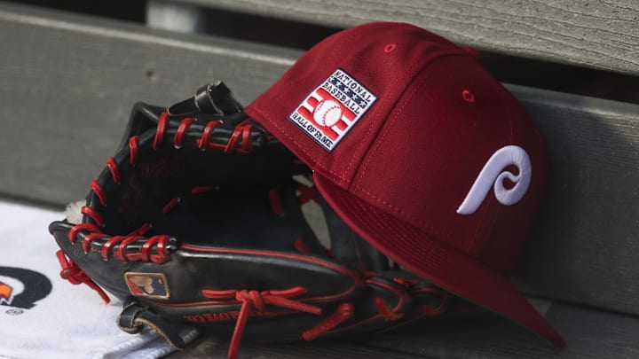 Jul 25, 2025; Bronx, New York, USA; A detailed view of a Hall of Fame patch on a Philadelphia Phillies hat resting in the dugout during the second inning against the New York Yankees at Yankee Stadium. 
