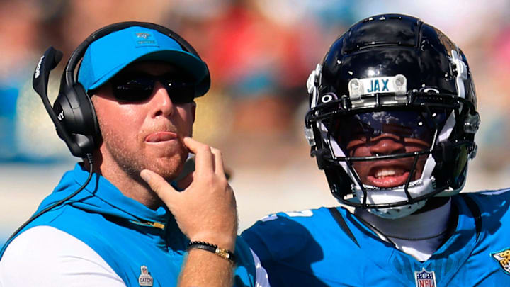 Jacksonville Jaguars head coach Liam Coen looks to the video scoreboard with wide receiver Travis Hunter (12) during the fourth quarter of an NFL football matchup, Sunday, Oct. 12, 2025, at EverBank Stadium in Jacksonville, Fla. The Seahawks defeated the Jaguars 20-12. [Corey Perrine/Florida Times-Union]