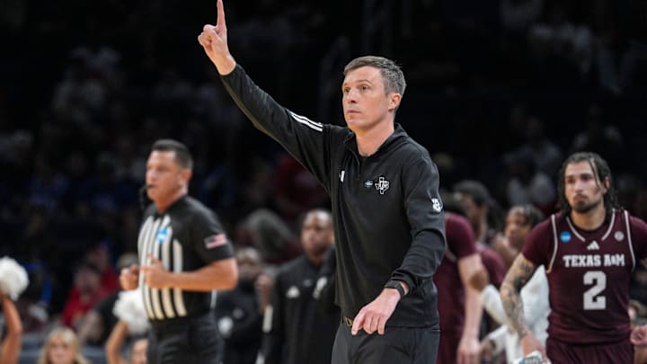 Texas A&M head coach Bucky McMillan signals to his players in the first half during a first round men’s basketball game of the NCAA Tournament.