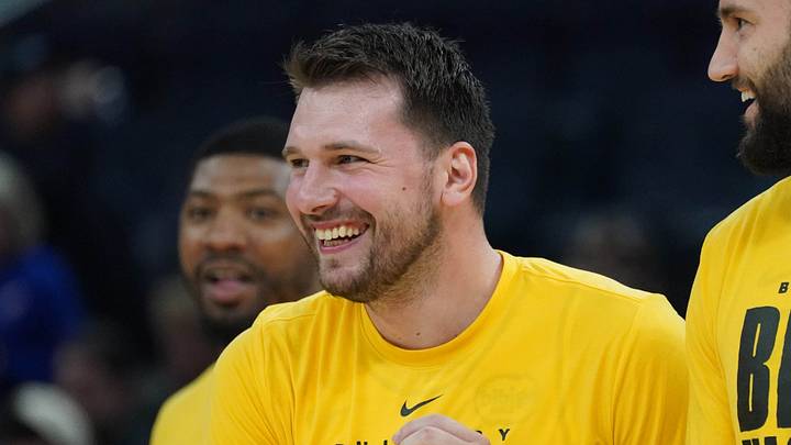 Feb 28, 2026; San Francisco, California, USA;  Los Angeles Lakers forward/guard Luka Doncic (77) laughs with forward-center Maxi Kleber (14) during pre-game warmups during a game against the Golden State Warriors at Chase Center. Mandatory Credit: David Gonzales-Imagn Images