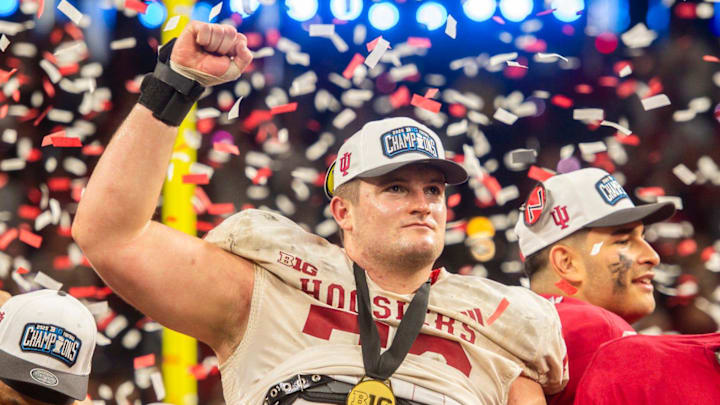 Indiana center Pat Coogan celebrates Dec. 6, 2025, after beating Ohio State in the Big Ten title game at Lucas Oil Stadium. Indiana center Pat Coogan celebrates Dec. 6, 2025, after beating Ohio State in the Big Ten title game at Lucas Oil Stadium.