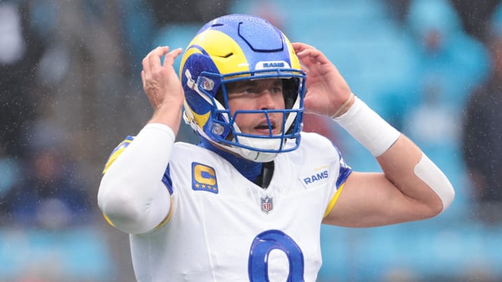 Nov 30, 2025; Charlotte, North Carolina, USA; Los Angeles Rams quarterback Matthew Stafford (9) calls a play during the fourth quarter against the Carolina Panthers at Bank of America Stadium. Mandatory Credit: Scott Kinser-Imagn Images